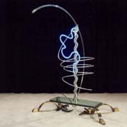 een compositie met glas, veren, messing, neon, aluminium, glas